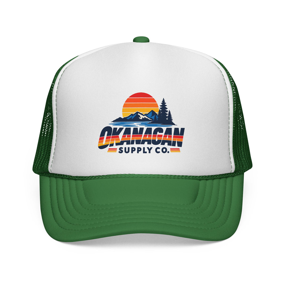 Okanagan Supply Co. Vintage Outdoors trucker hat in green, front view with retro sunset, mountain and pine logo