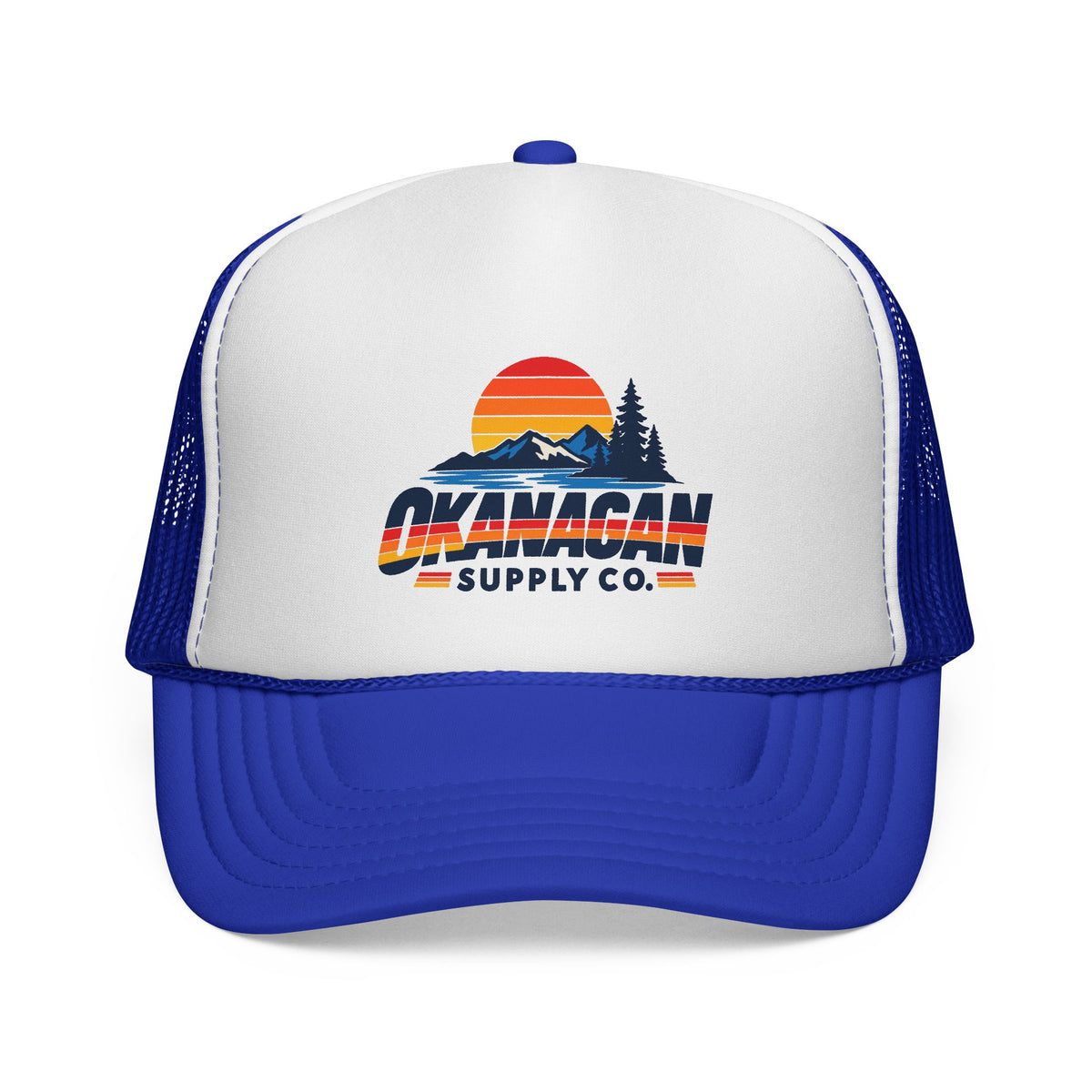 Okanagan Supply Co. Vintage Outdoors trucker hat in royal blue, front view with retro sunset, mountain and pine logo
