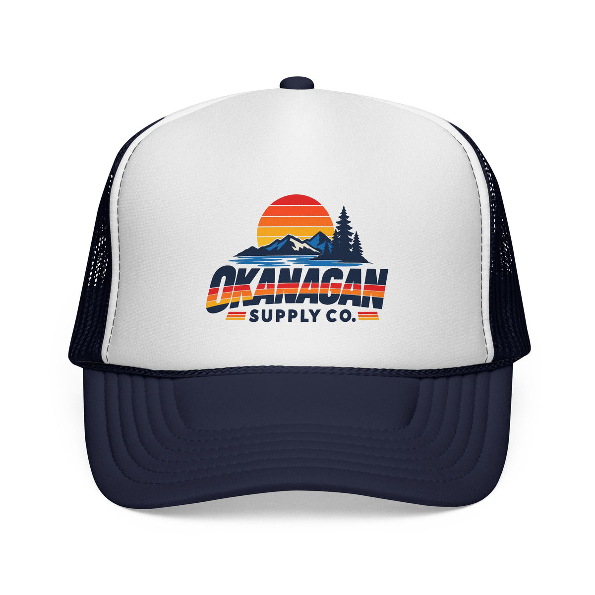 Okanagan Supply Co. Vintage Outdoors trucker hat in dark navy, front view with retro sunset, mountain and pine logo