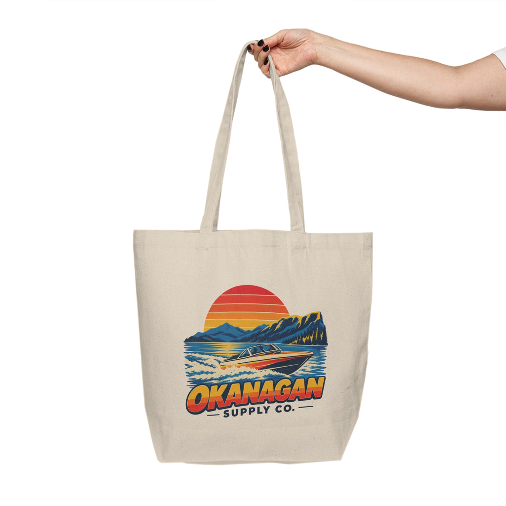 Okanagan Supply Co. Lake Day Speedboat Canvas Tote carried by the shoulder strap
