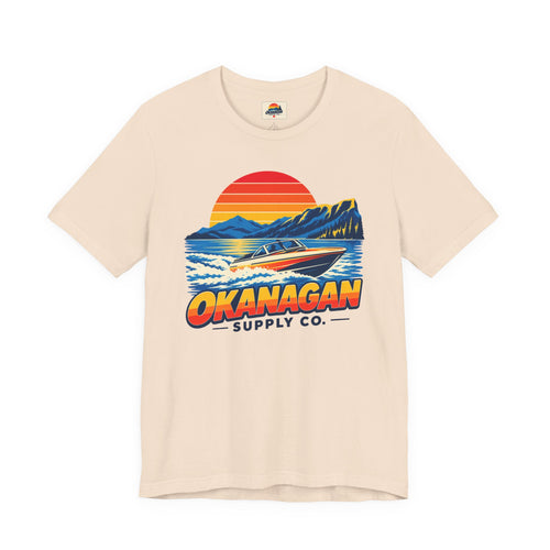 Okanagan Supply Co. Lake Day Speedboat Tee in soft cream, front view with retro speedboat and sunset print