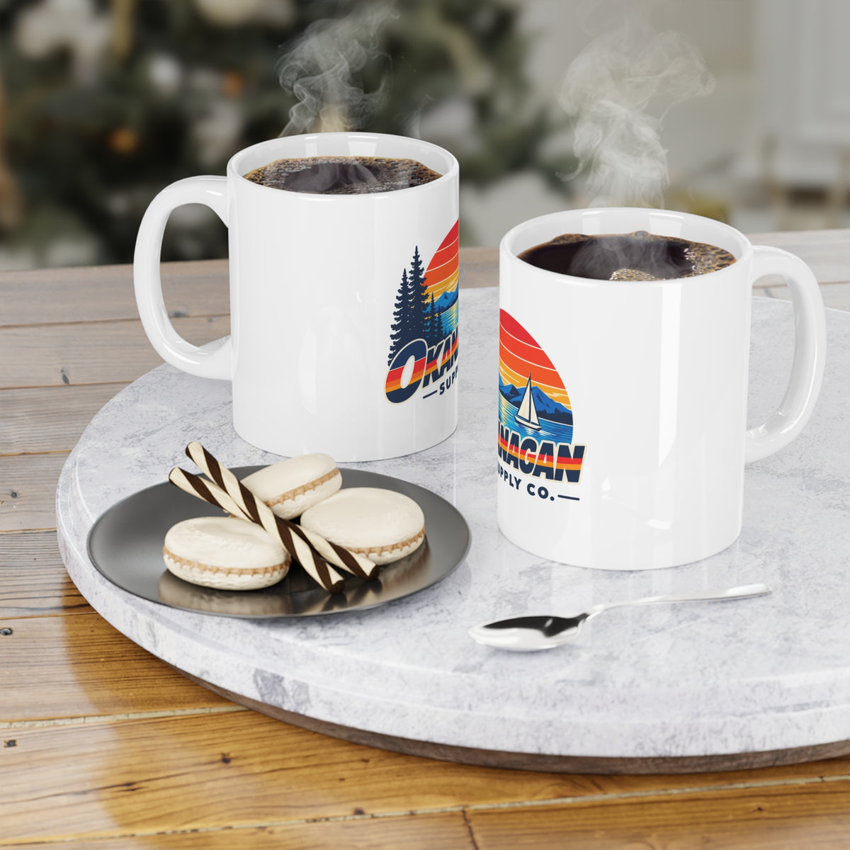 Okanagan Supply Co. Sailboat ceramic mug styled with coffee
