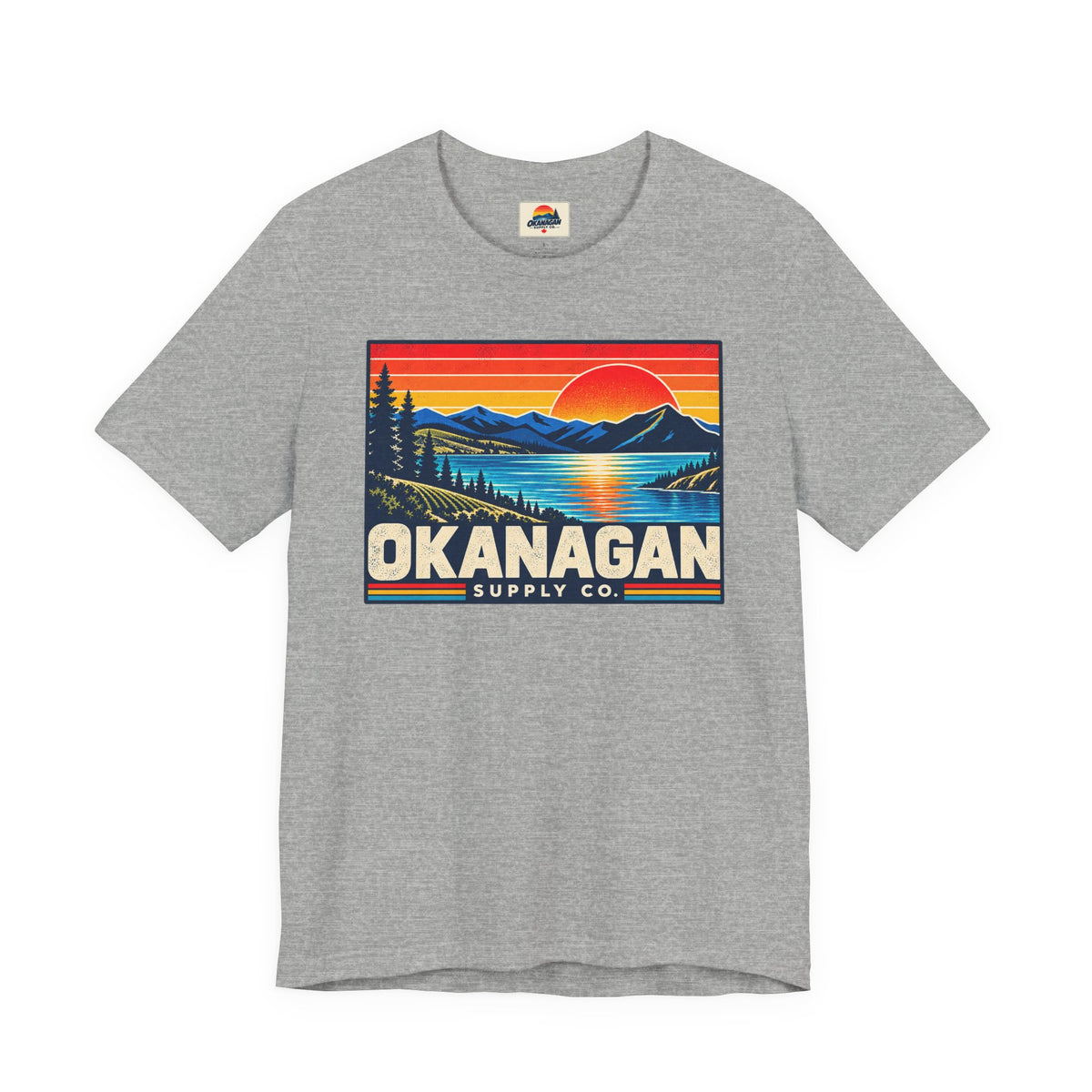 Okanagan Supply Co. Retro Sunset Tee in athletic heather, front view with retro Okanagan lake sunset badge